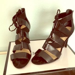 Nine West Black strappy heels.  Zip up back.